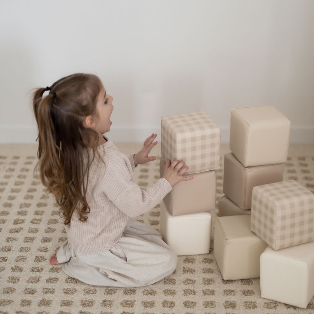 Stacking, knocking down and building up leather blocks for kids designed in Canada