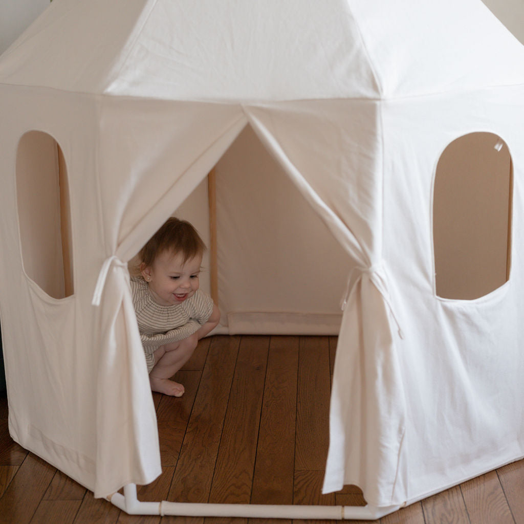 A play tent large enough to be loved by multiple kids or parents while blending  into any living space