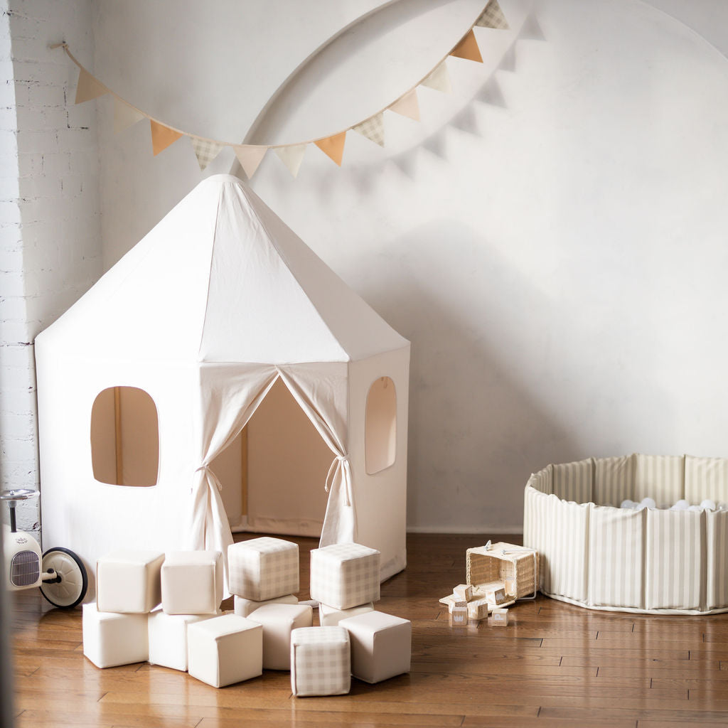 A whimsical play tent designed to be loved for years by toddlers and babies 